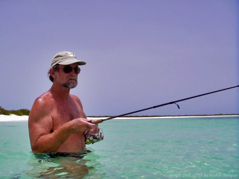 Walker fishing at Cow Wreck Beach.