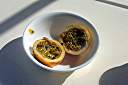 This is a yellow passion fruit, which Walker has cut in half to remove the juice and pulp.