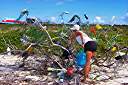 Nancy adding a swim fin to the beach trash sculpture near the southwestern end of Anegada, just to the east of Pomato Point. These impromptu collaborative works of 