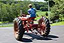 Taking the Farmall for a spin. The last time I drove a Farmall H was in 1960 - plowing my grandfather's soybean field.
