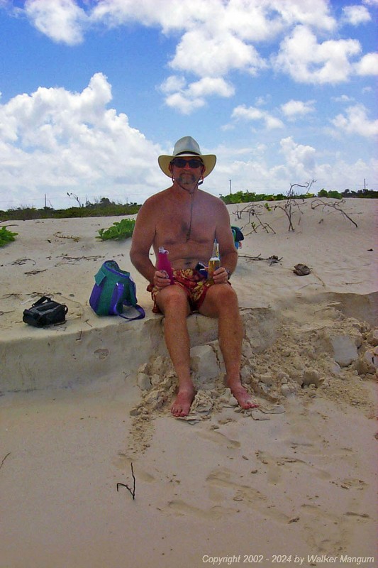 Walker taking a Carib break during the walk to Cow Wreck Beach. This is on the west end of Anegada at "Half-Way" Point.
