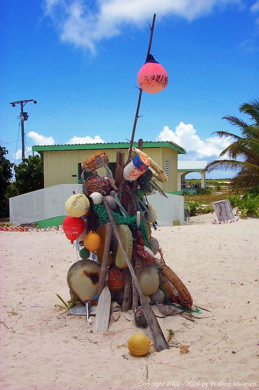 A collection of beach junk at Cow Wreck Beach. We picked up a couple of contributions to this piece of art on our walk around to Cow Wreck from the Anegada Reef Hotel.