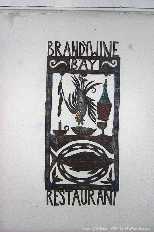 Our dinner on the last night of this trip to the BVI was at Brandywine Bay Restaurant. This piece of art work by Aragorn, made from an old metal refrigerator door, was one of Aragorn's first pieces. The restaurant's logo was taken from this piece. In our opinion Brandywine Bay, in its beautiful and romantic setting with sweeping views of the Sir Francis Drake Channel islands, is the finest restaurant in the BVI. Owners Davide and Cele Pugliese are gracious hosts that provide a remarkable menu of wonderful Tuscan-styled food with a fine selection of wines.