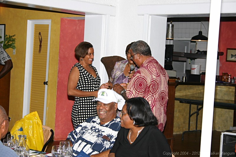 Taste of the Caribbean Competition
Fundraising / Chef's Practice Dinner
Brandywine Bay Restaurant

Delma Maduro presenting an honorary team cap to former Deputy Governor Elton Georges.