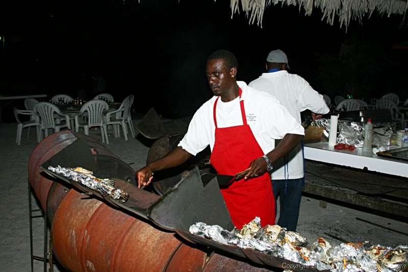 Chef Derrick working on the famous Anegada Reef Hotel barbecued lobster,
