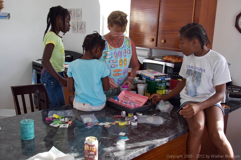 Dyeing Easter eggs with Trayesha, Janesha, and Lakesha.