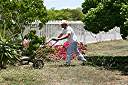 Walker mowing the garden