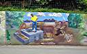 The "Wall", a long and colourful mural along Tortola's Ridge Road, depicts many aspects of BVI heritage.