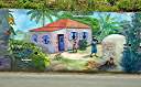 The "Wall", a long and colourful mural along Tortola's Ridge Road, depicts many aspects of BVI heritage.