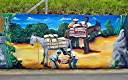 The "Wall", a long and colourful mural along Tortola's Ridge Road, depicts many aspects of BVI heritage.