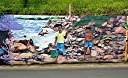 The "Wall", a long and colourful mural along Tortola's Ridge Road, depicts many aspects of BVI heritage.