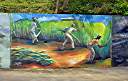 The "Wall", a long and colourful mural along Tortola's Ridge Road, depicts many aspects of BVI heritage.