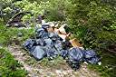 This is one of the things that really pisses me off. Someone is too lazy to take their trash to the garbage dump, so they just toss it in the bush. Whoever did this has no respect for this island.