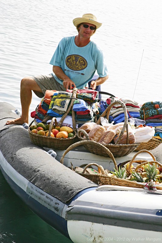 Local artist Aragorn Dick-Read, about to set out on his morning round of selling fresh fruits, vegetables, and T-shirts in the Trellis Bay/Marina Cay anchorages.